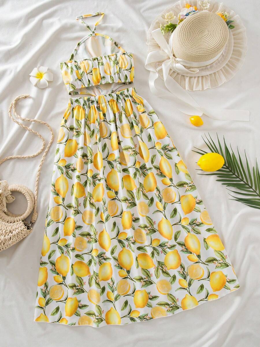 Tween girls floral halter dress with backless sleeveless design, belted high waist, shirred details, appliques, and flared A-line midi silhouette for summer vacation or graduation outfit.