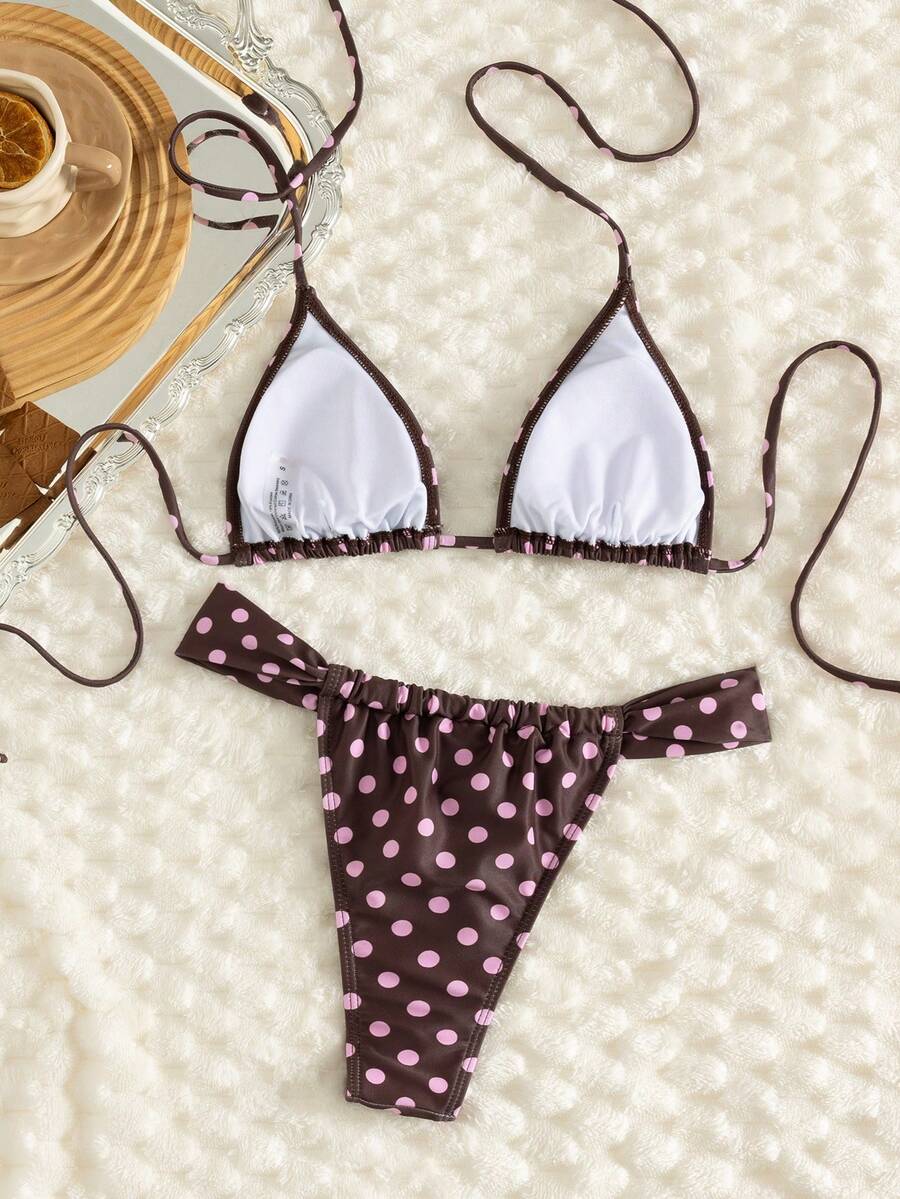 Women's striped halter two-piece swimsuit featuring a lace-up triangle top with removable padding and high-cut low-waist bikini bottoms.
