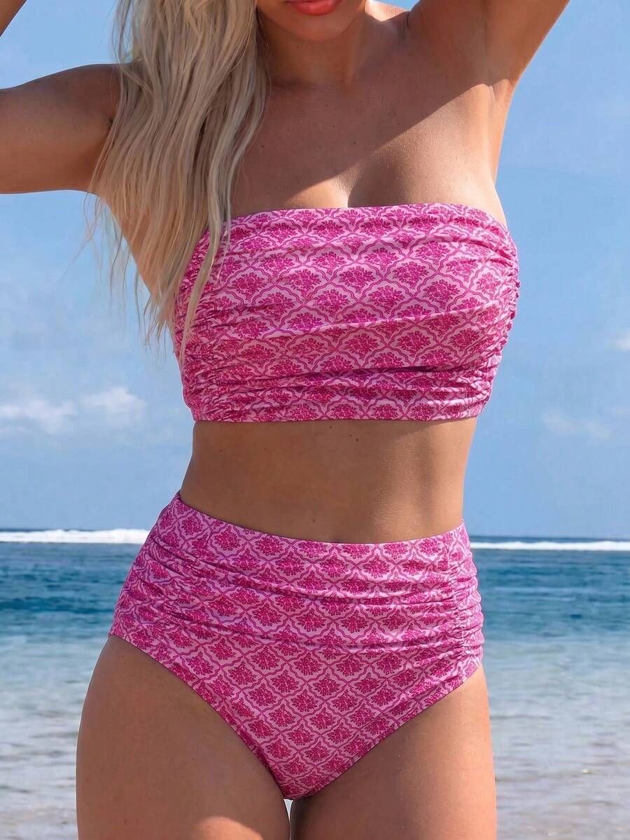 Women's black strapless ruched bandeau bikini top with high waisted bottoms