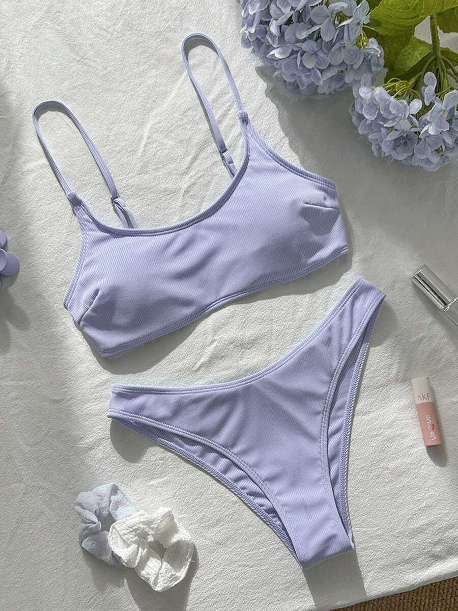 Apricot ribbed high waist two piece bikini swimsuit set for women featuring backless spaghetti strap top and high waisted bottoms.