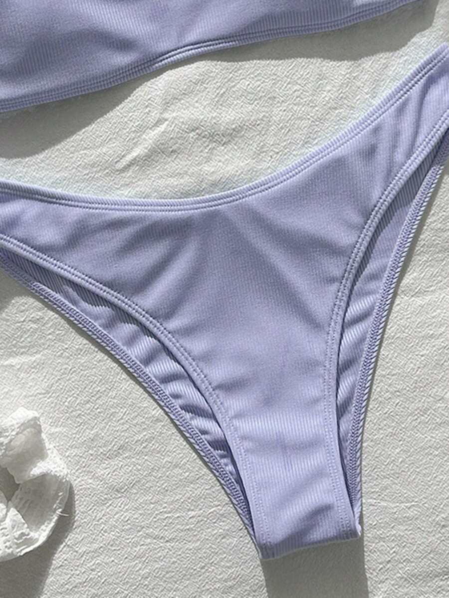 Apricot ribbed high waist two piece bikini swimsuit set for women featuring backless spaghetti strap top and high waisted bottoms.