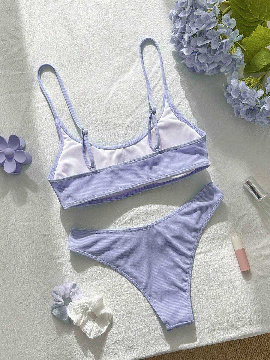 Apricot ribbed high waist two piece bikini swimsuit set for women featuring backless spaghetti strap top and high waisted bottoms.