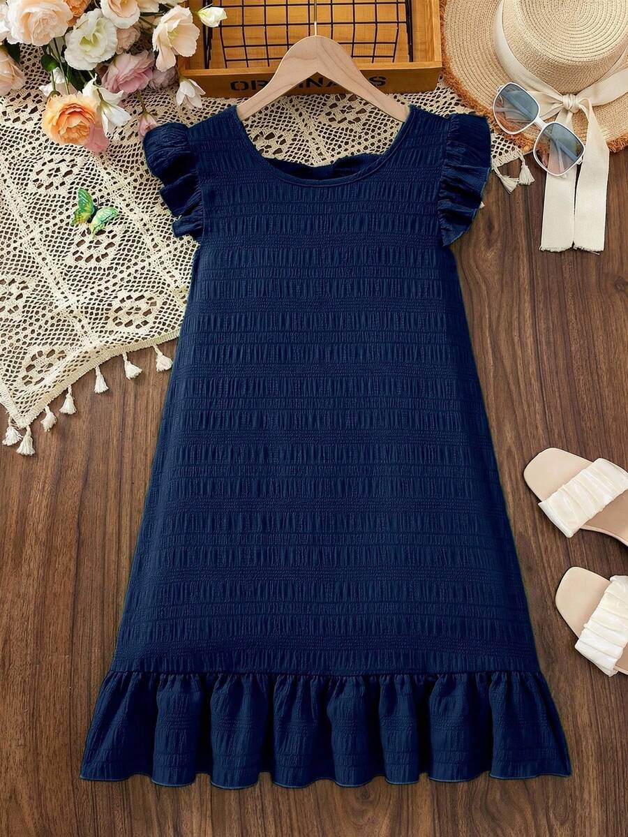 Tween girls apricot vacation midi dress featuring a round neck, cut out details, ruffle flounce accents, and geometric pattern.