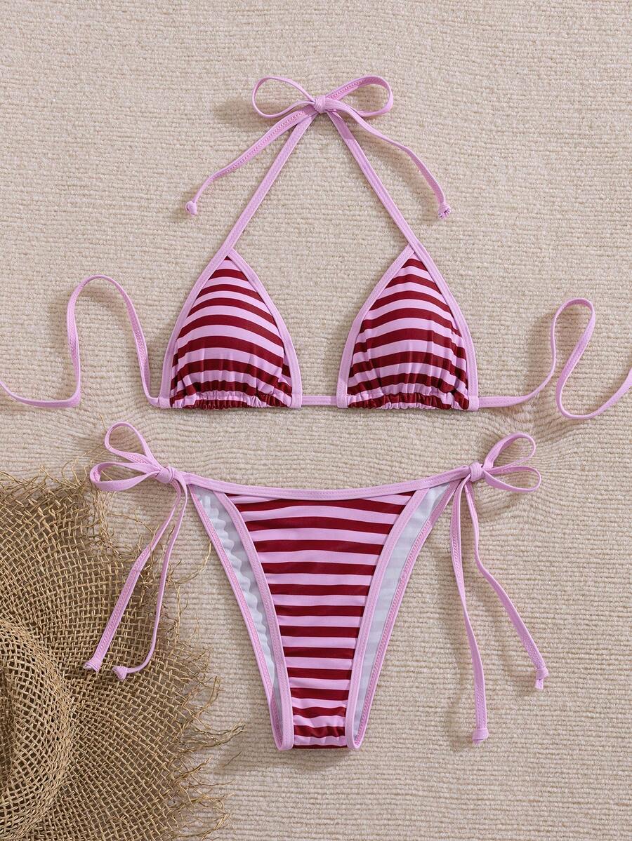 Women's two-piece halter triangle bikini set featuring a backless tie-back top with removable padding and matching tie-side mid-waist bottoms.