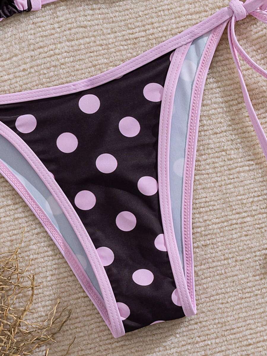 Women's two-piece halter triangle bikini set featuring a backless tie-back top with removable padding and matching tie-side mid-waist bottoms.