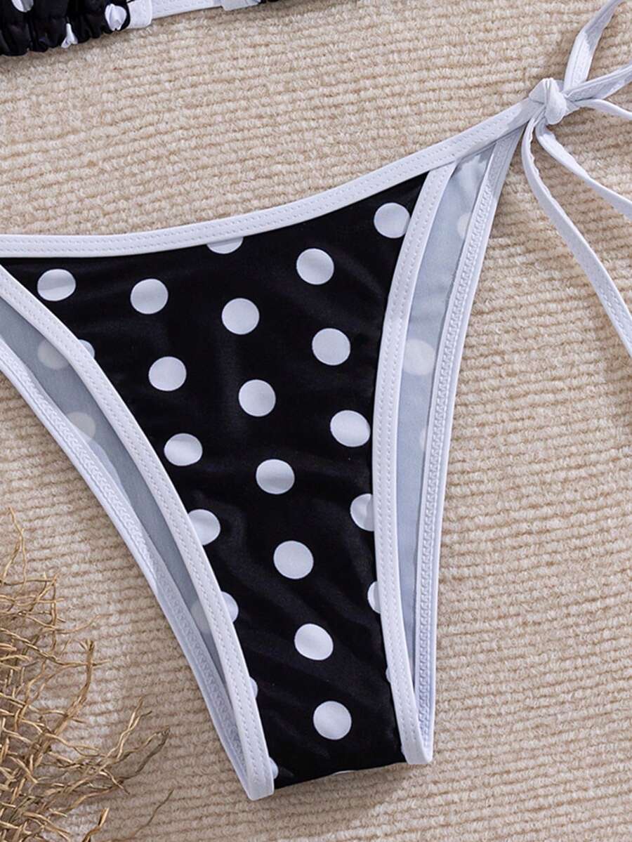 Women's two-piece halter triangle bikini set featuring a backless tie-back top with removable padding and matching tie-side mid-waist bottoms.