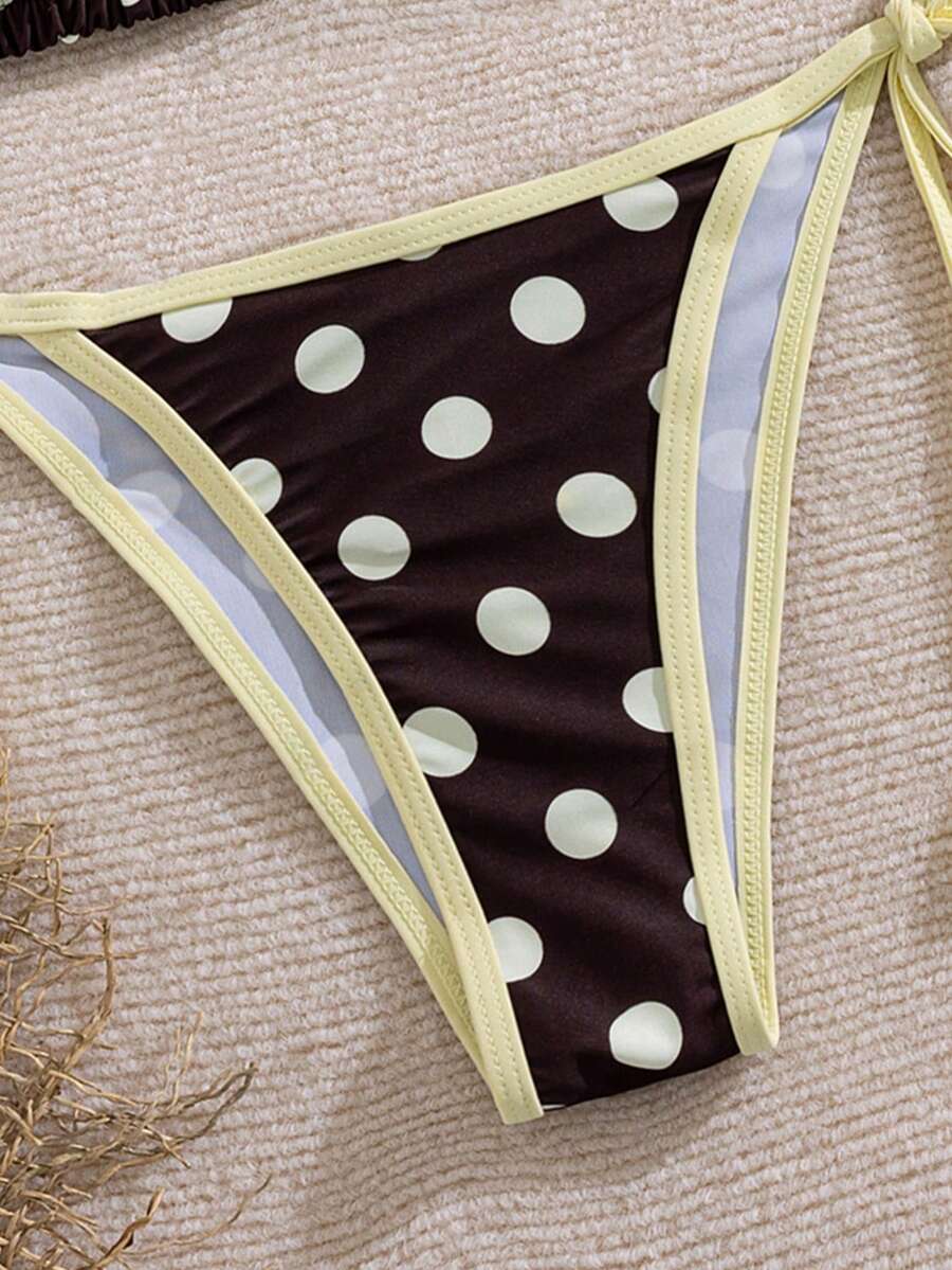 Women's two-piece halter triangle bikini set featuring a backless tie-back top with removable padding and matching tie-side mid-waist bottoms.