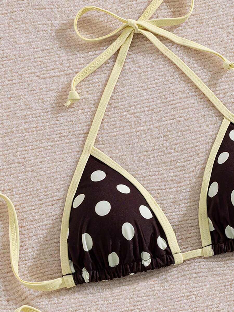 Women's two-piece halter triangle bikini set featuring a backless tie-back top with removable padding and matching tie-side mid-waist bottoms.