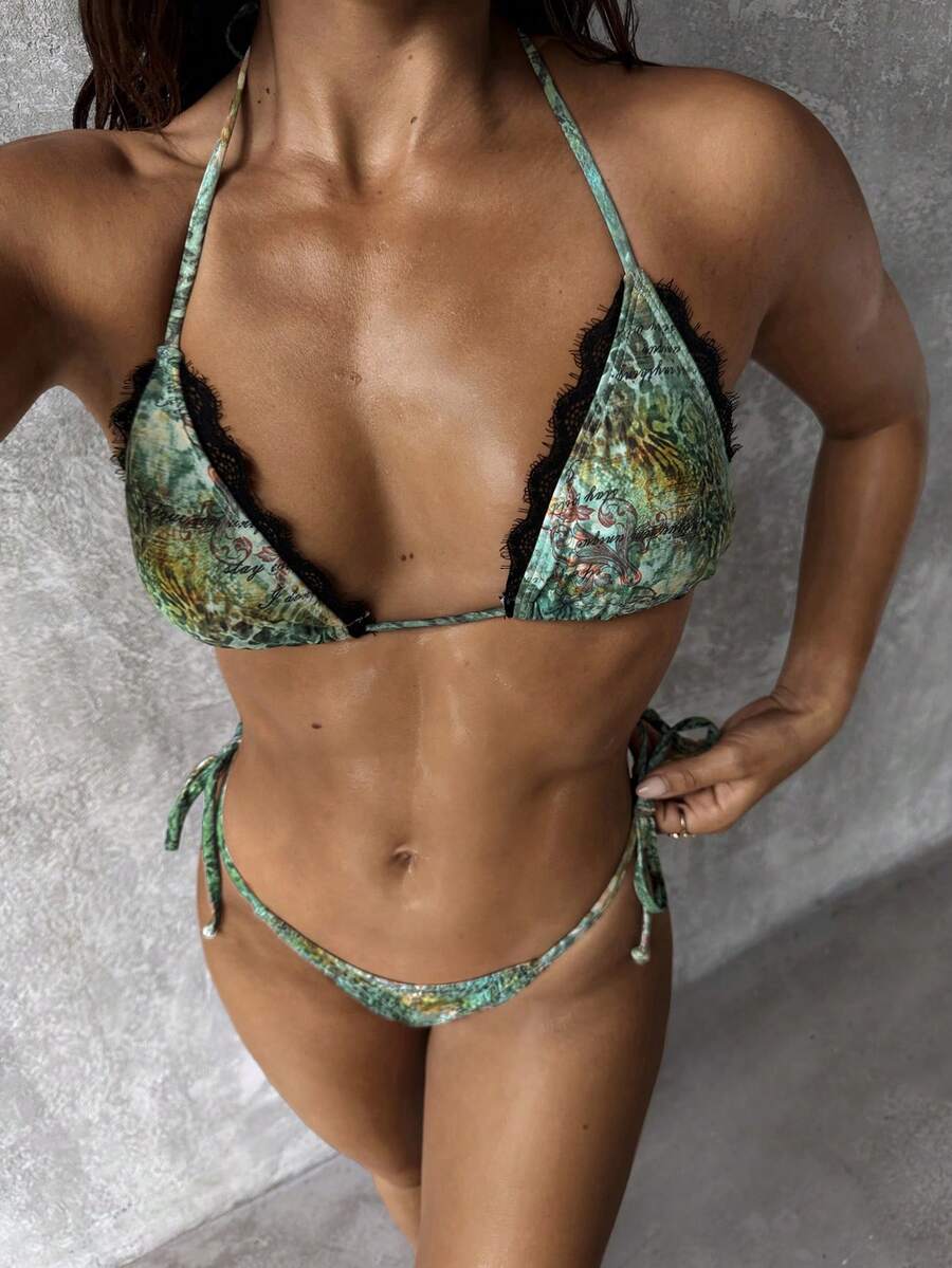 Black high-waisted bikini set featuring a halter wireless triangle top and adjustable tie-side bottoms for women.