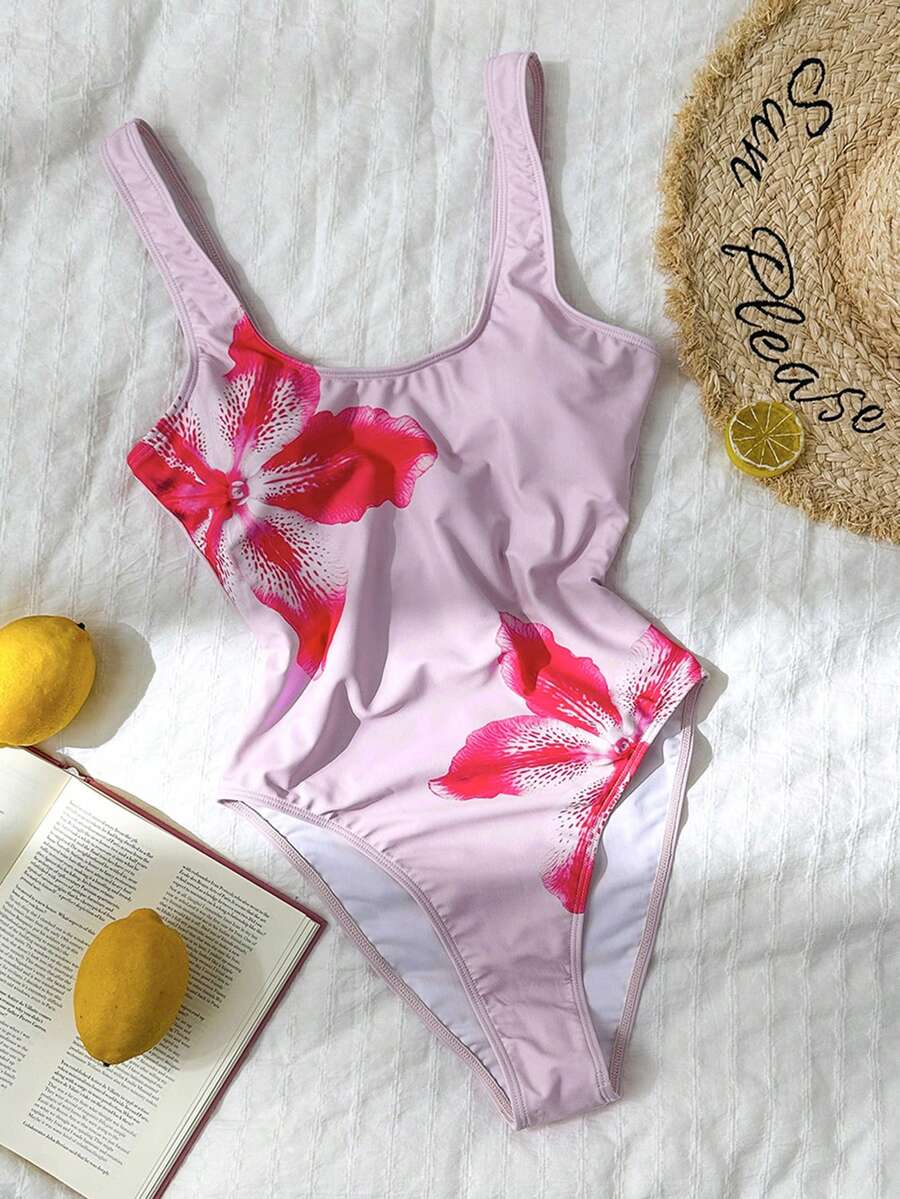 Women's solid color one-piece swimsuit featuring a backless scoop neck design and high cut fit