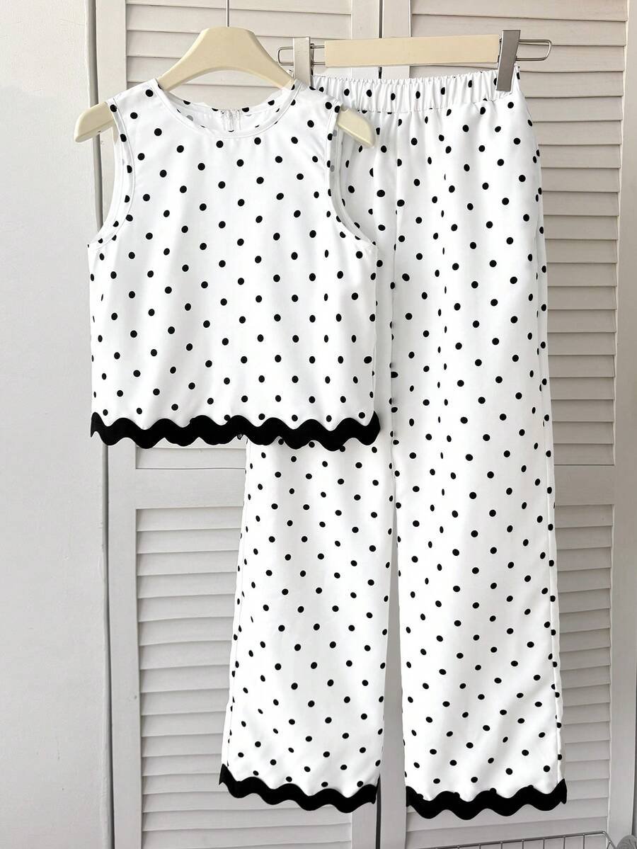 Tween girls casual apricot striped sleeveless top with round neck and ruffle hem paired with matching straight leg pants.