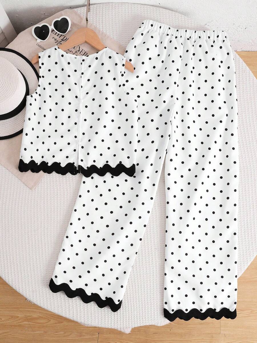 Tween girls casual apricot striped sleeveless top with round neck and ruffle hem paired with matching straight leg pants.