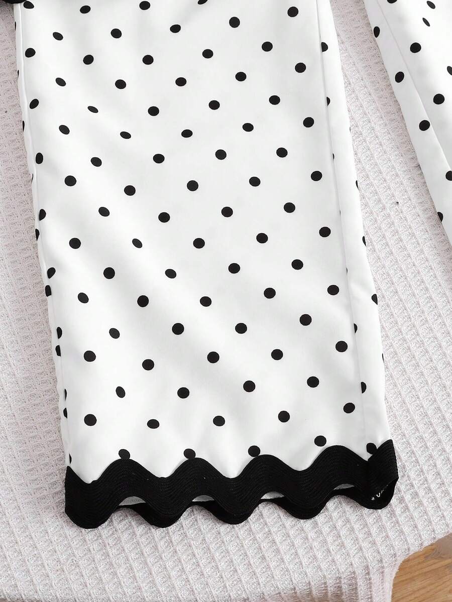 Tween girls casual apricot striped sleeveless top with round neck and ruffle hem paired with matching straight leg pants.