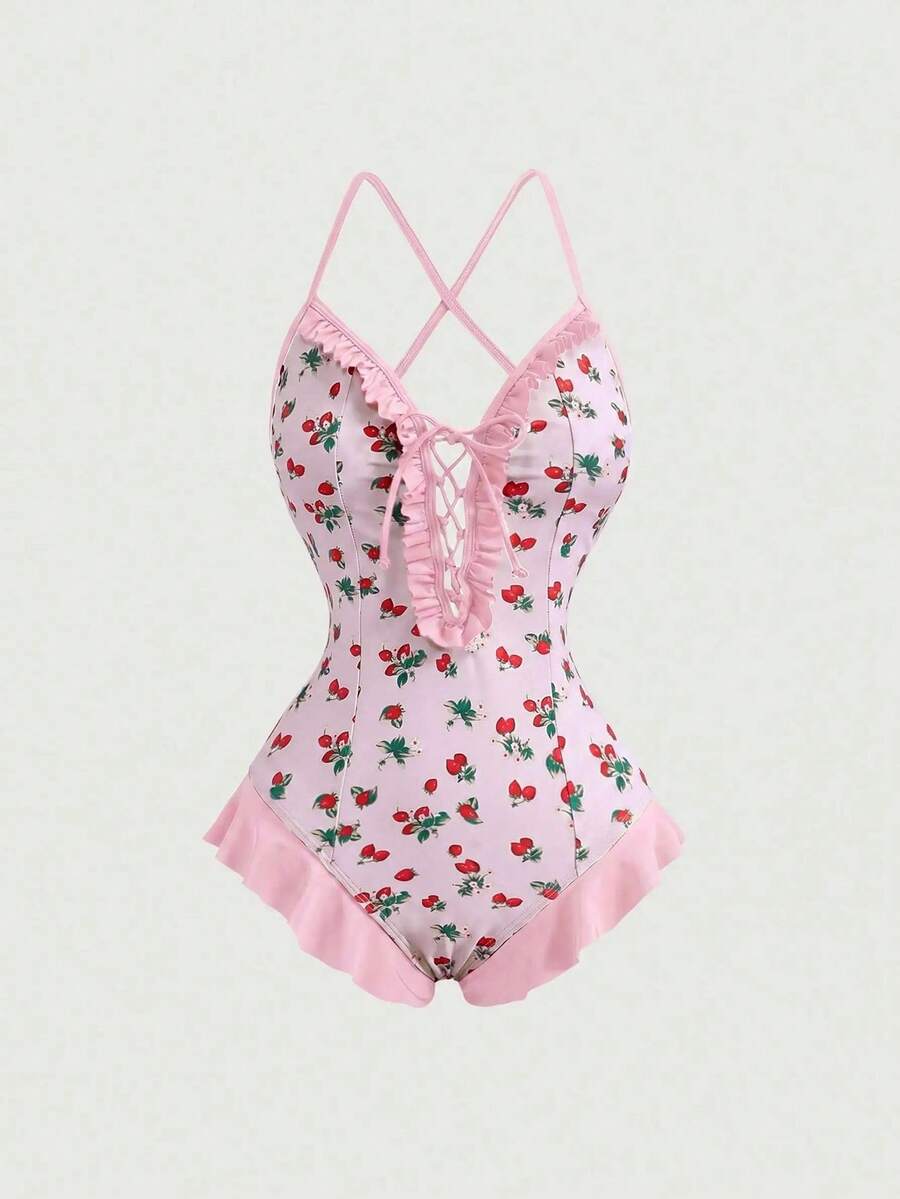 Women's strawberry print one-piece swimsuit featuring ruffle details, front-tie design, backless criss-cross straps, and triangle wireless cups.