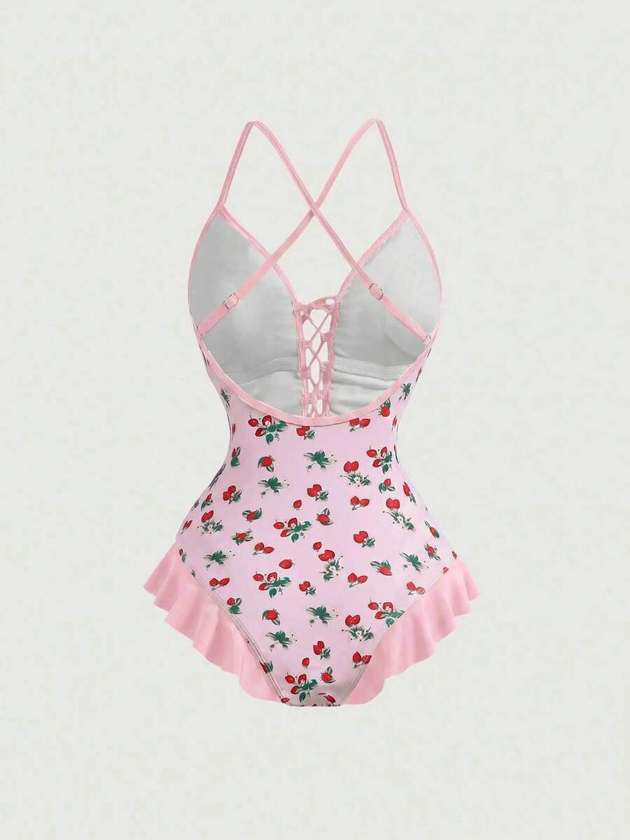 Women's strawberry print one-piece swimsuit featuring ruffle details, front-tie design, backless criss-cross straps, and triangle wireless cups.