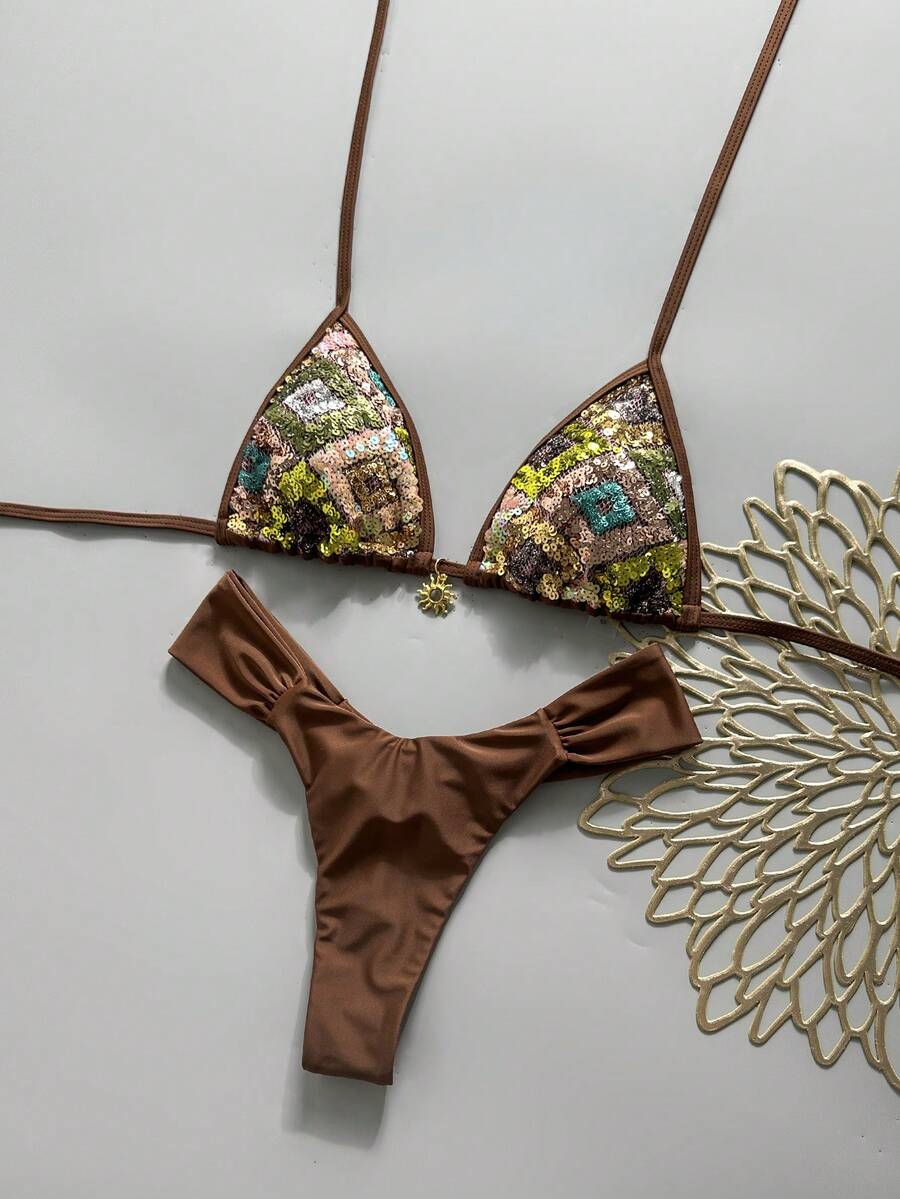 Women's 2-piece triangle cup bikini set in solid color featuring woven pearl shell decoration, halter neckline, and high-waist side-tie ruched bottoms.