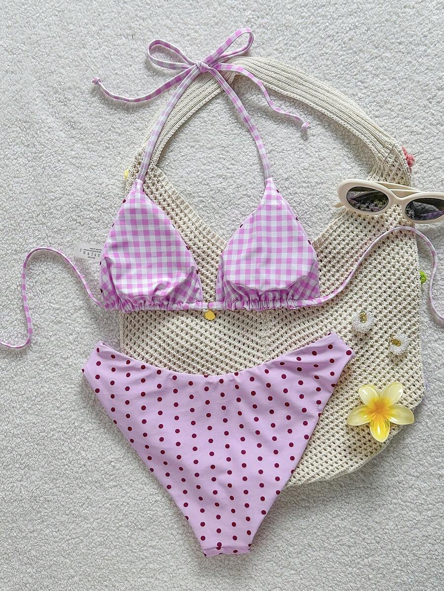 Women's black textured plaid 2-piece bikini set featuring a halter neckline, wireless triangle cups with removable padding, and mid-waist bottoms.