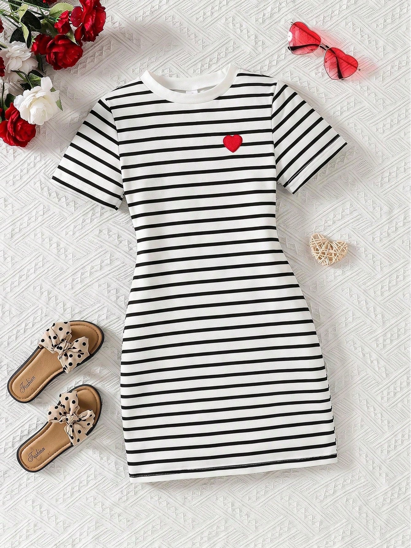 Girls black striped midi dress featuring short sleeves, round neck, slim fit, and flared hem.