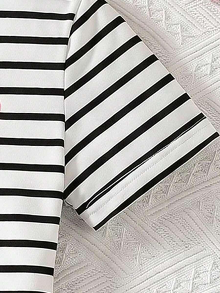 Girls black striped midi dress featuring short sleeves, round neck, slim fit, and flared hem.