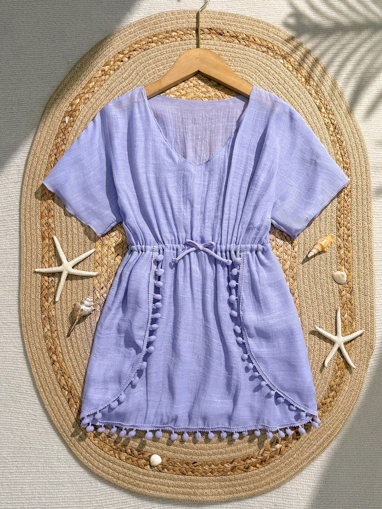 White tween girls swimsuit cover-up with V neck, short sleeves, contrast lace, fringe details, and regular length mesh fabric for beachwear