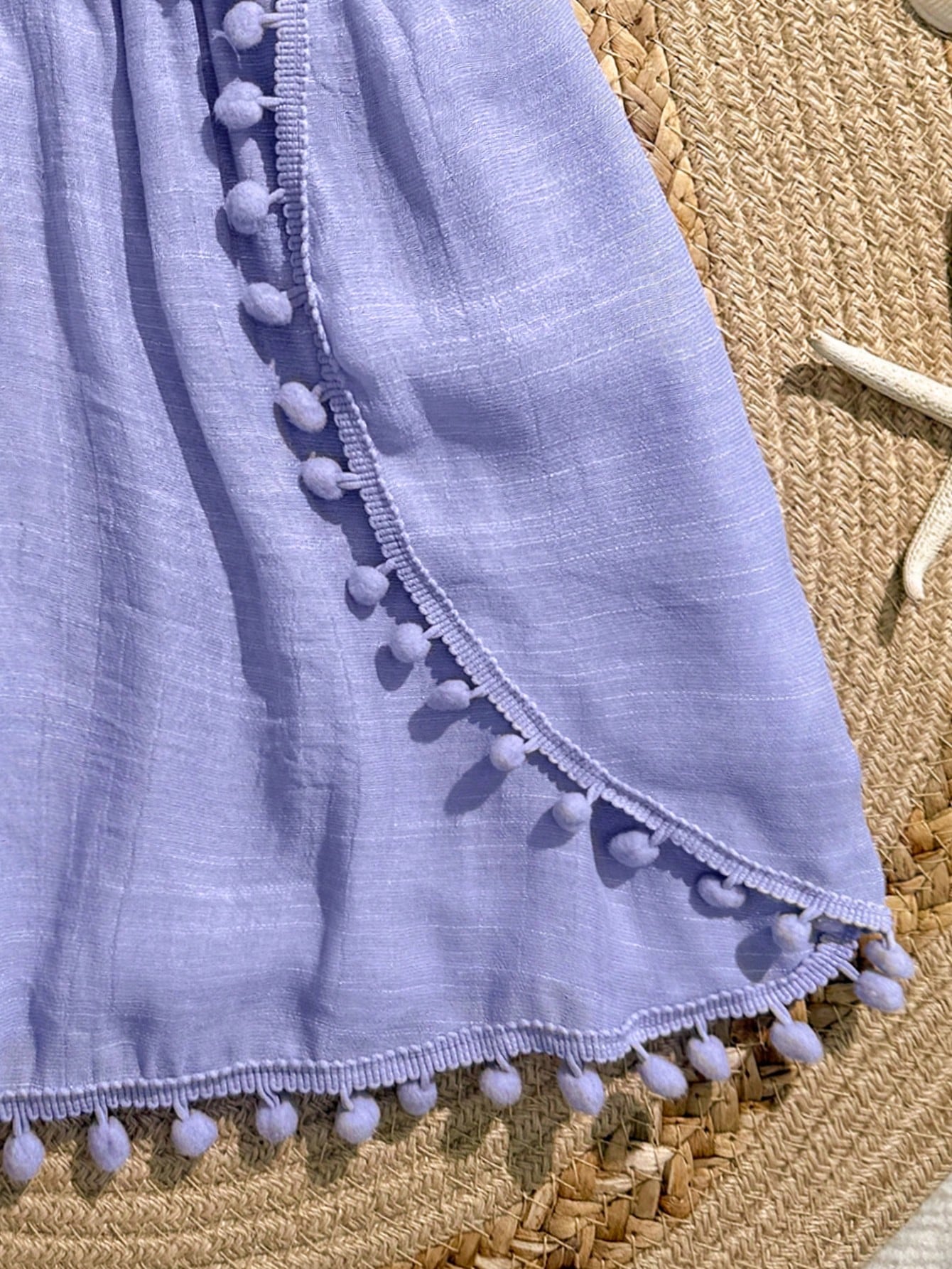 White tween girls swimsuit cover-up with V neck, short sleeves, contrast lace, fringe details, and regular length mesh fabric for beachwear