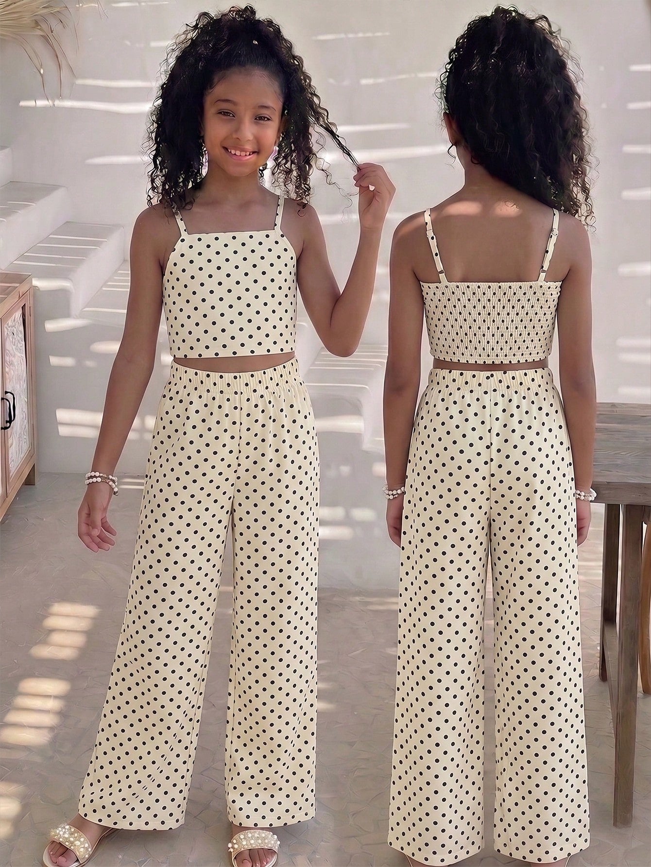 Tween girls casual 2-piece set featuring an apricot woven camisole crop top with back shirring and matching high-waisted loose long pants.