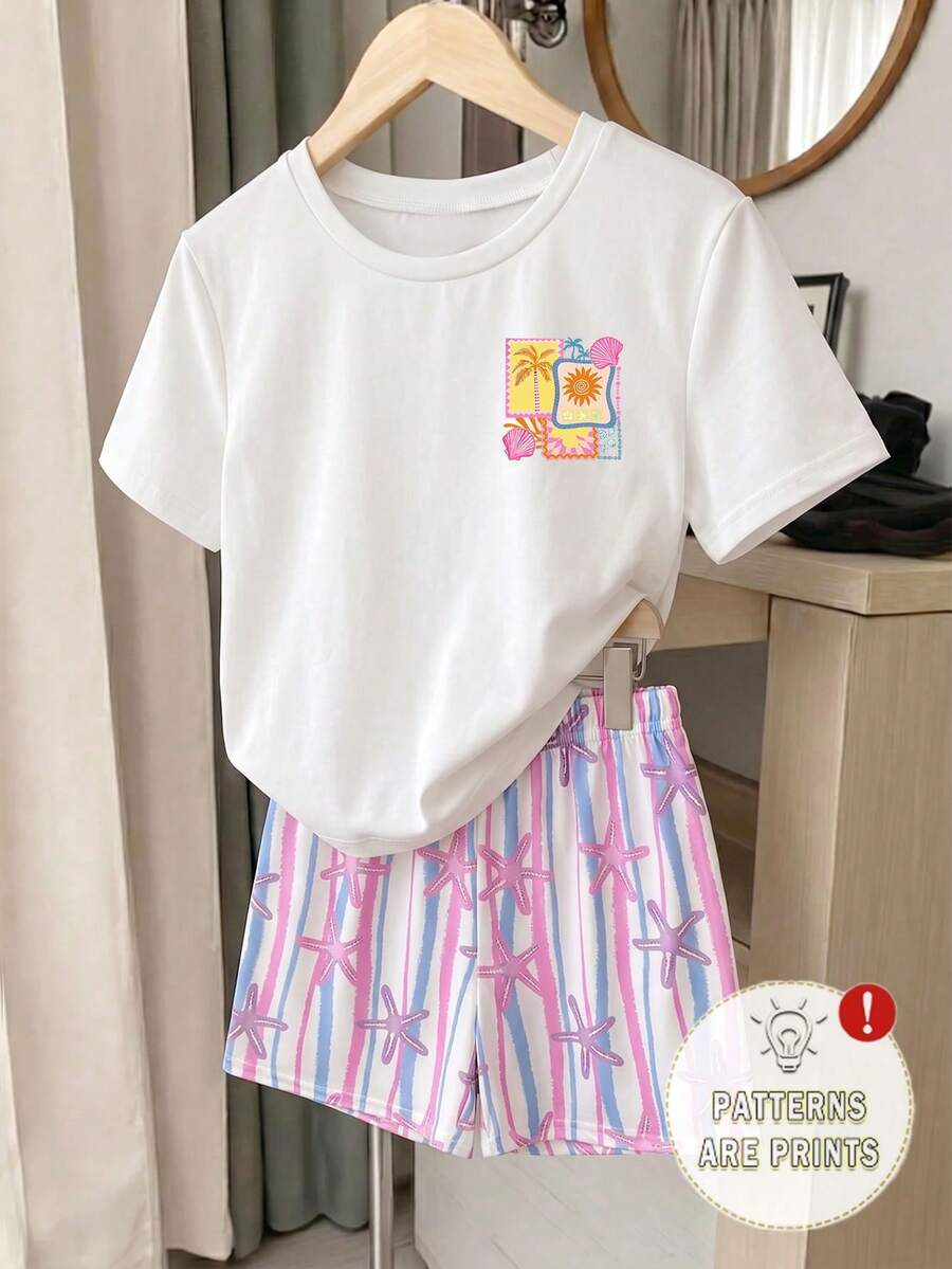 Girls' multicolor short sleeve T-shirt and shorts set featuring a cute cherry and bow print with round neck top and matching shorts.