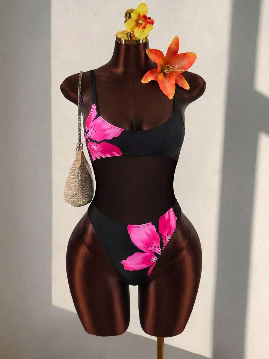 Black floral print mesh patchwork one-piece swimsuit for women featuring spaghetti straps, V-wired triangle cups, and a high waist silhouette.