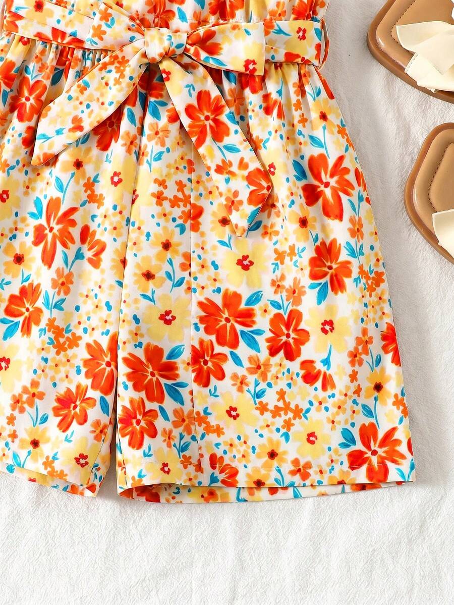 Tween girls 2-piece summer set featuring a turquoise blue ribbed tank top and tropical leaf pattern belted shorts.