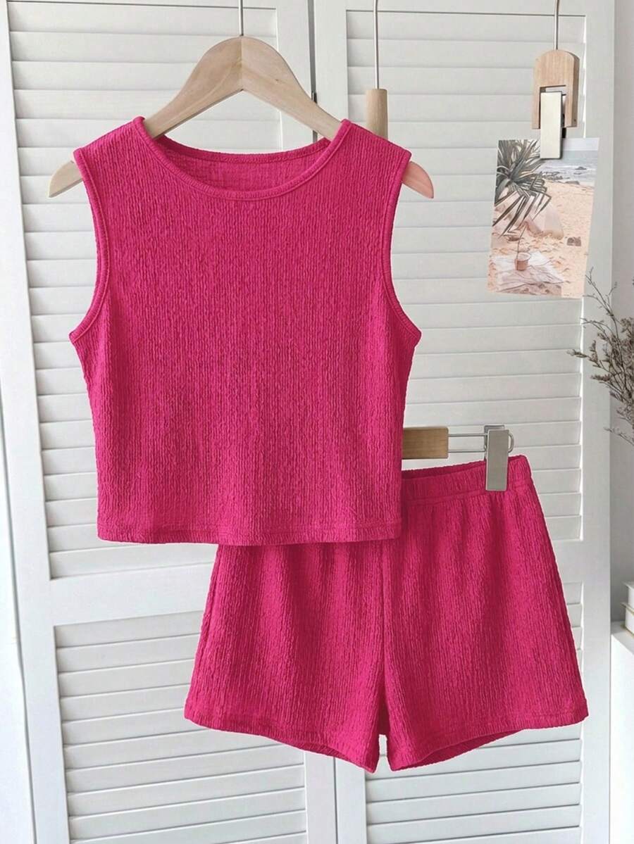 Tween girls black rib-knit round neck slim fit top and textured shorts casual summer set.