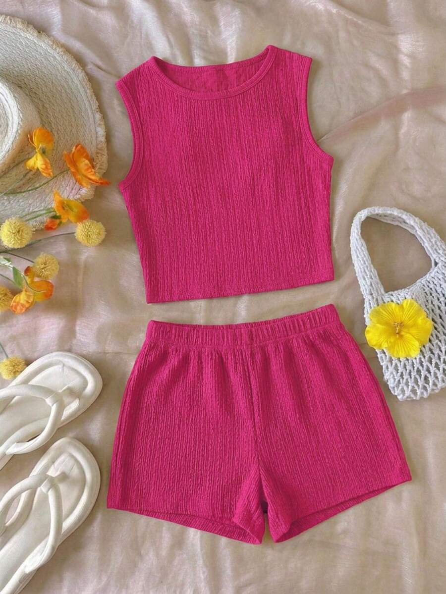 Tween girls black rib-knit round neck slim fit top and textured shorts casual summer set.