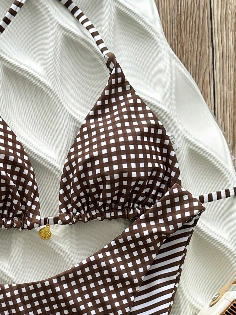 Women's black textured plaid 2-piece bikini set featuring a halter neckline, wireless triangle cups with removable padding, and mid-waist bottoms.