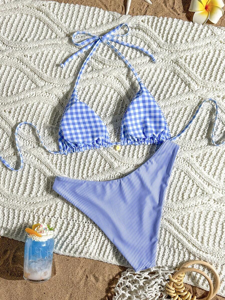 Women's black textured plaid 2-piece bikini set featuring a halter neckline, wireless triangle cups with removable padding, and mid-waist bottoms.