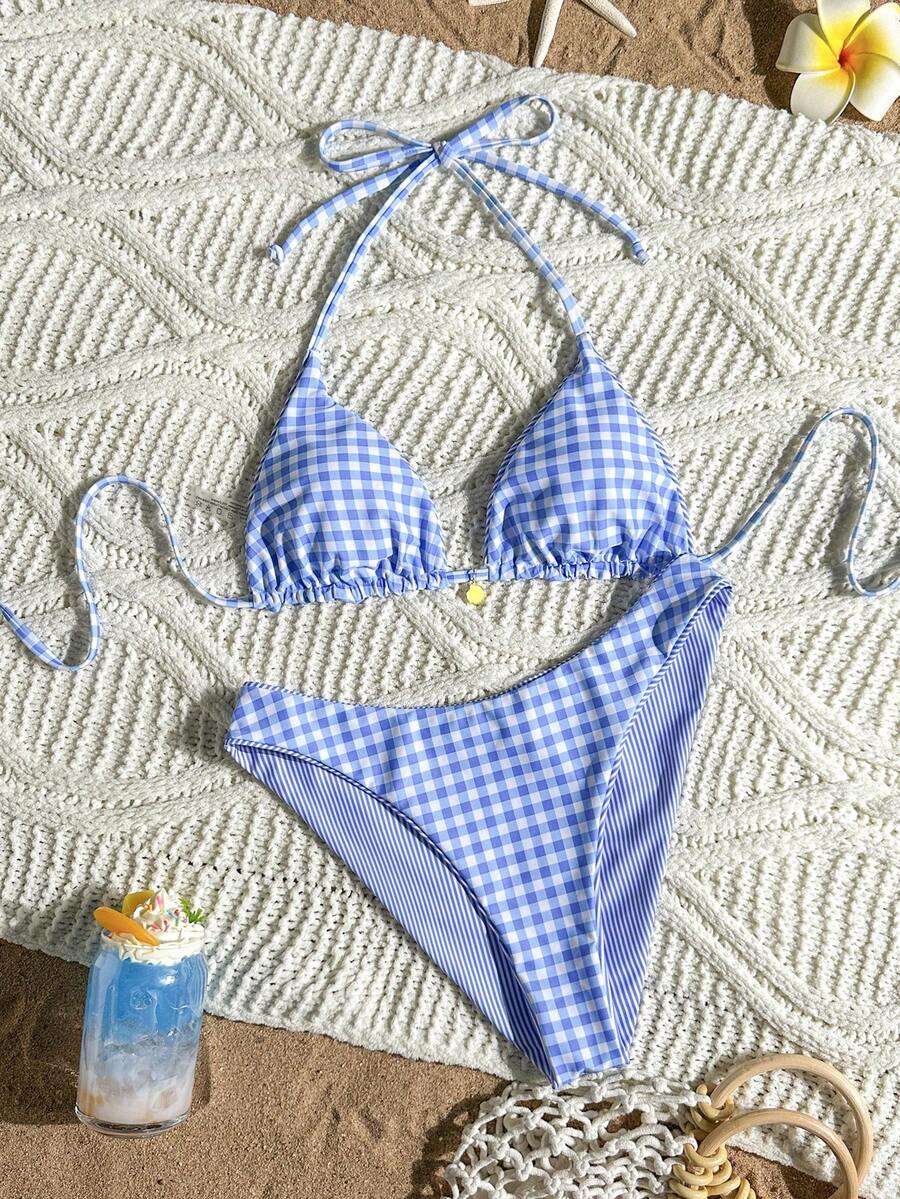 Women's black textured plaid 2-piece bikini set featuring a halter neckline, wireless triangle cups with removable padding, and mid-waist bottoms.