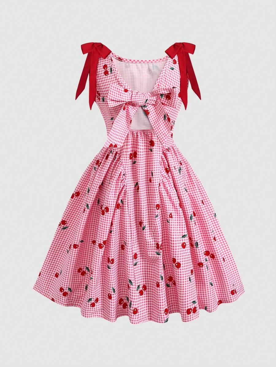 Black and white polka dot sleeveless A-line dress for tween girls featuring a scoop neck, high waist, and flared hem.