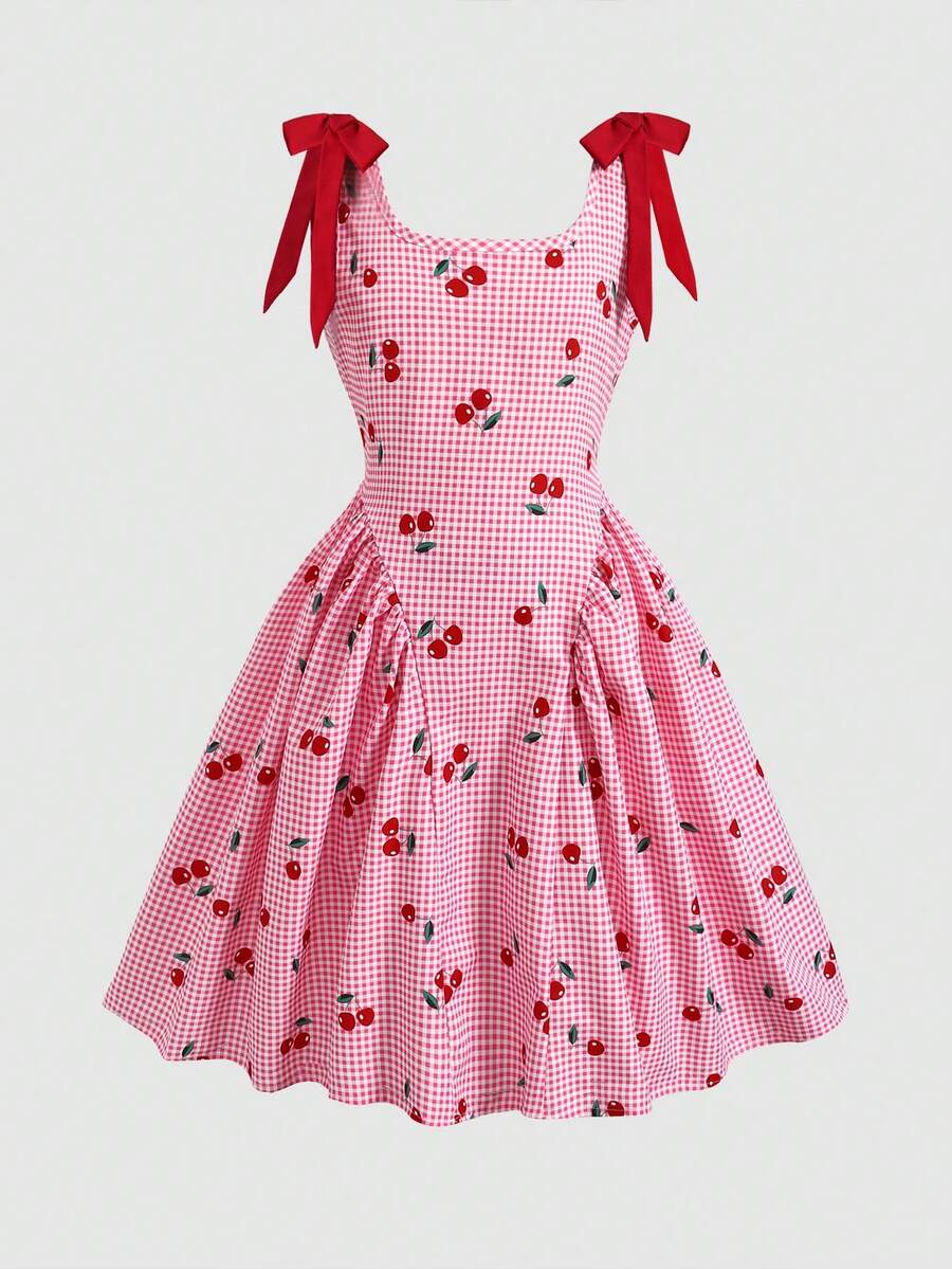 Black and white polka dot sleeveless A-line dress for tween girls featuring a scoop neck, high waist, and flared hem.