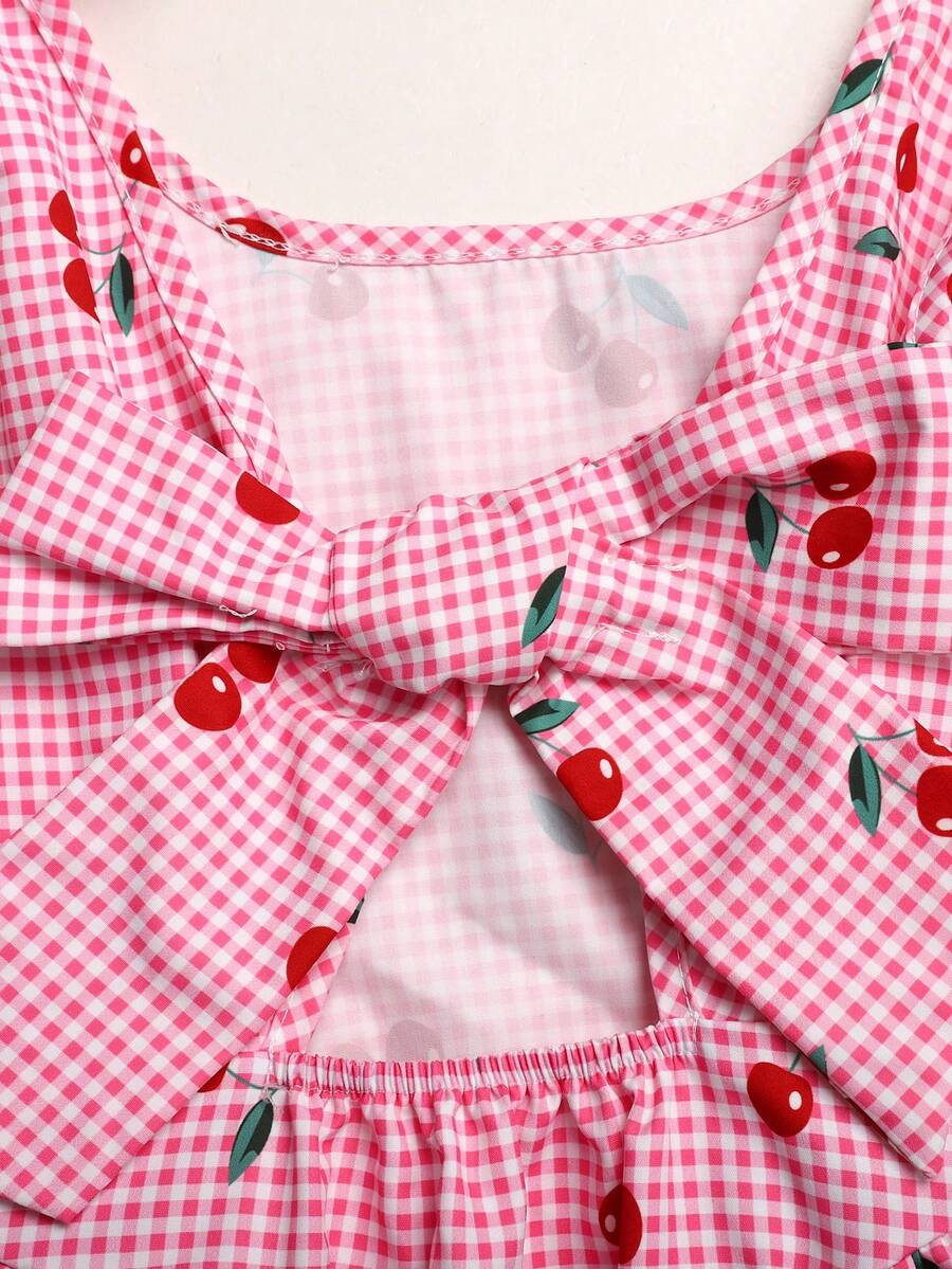 Black and white polka dot sleeveless A-line dress for tween girls featuring a scoop neck, high waist, and flared hem.