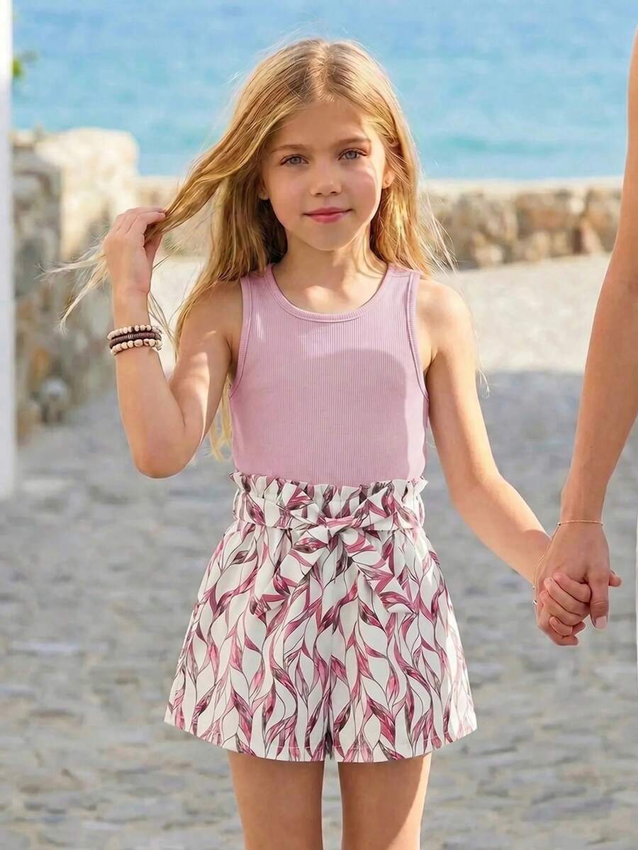 Tween girls 2-piece summer set featuring a turquoise blue ribbed tank top and tropical leaf pattern belted shorts.