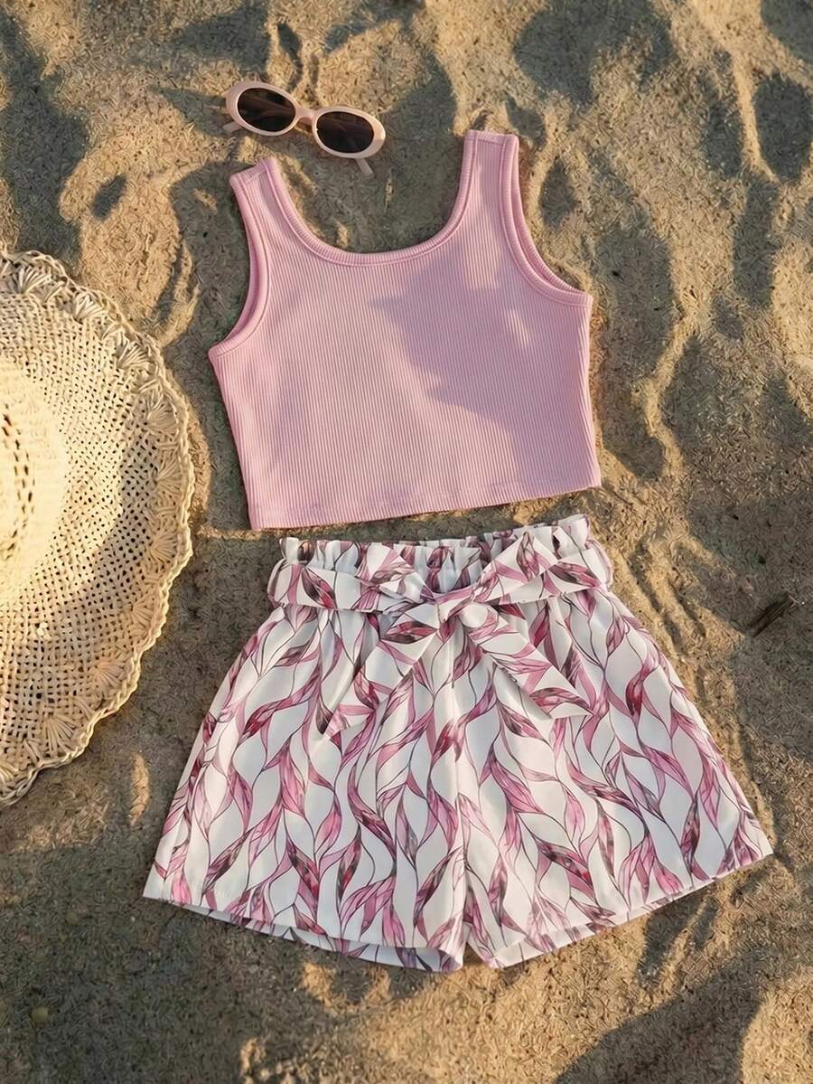 Tween girls 2-piece summer set featuring a turquoise blue ribbed tank top and tropical leaf pattern belted shorts.