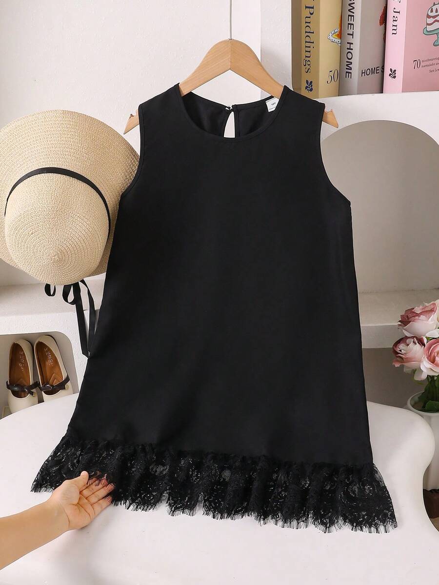 Tween girls casual leopard print smock mini dress featuring a round neck and flounce ruffle hem.