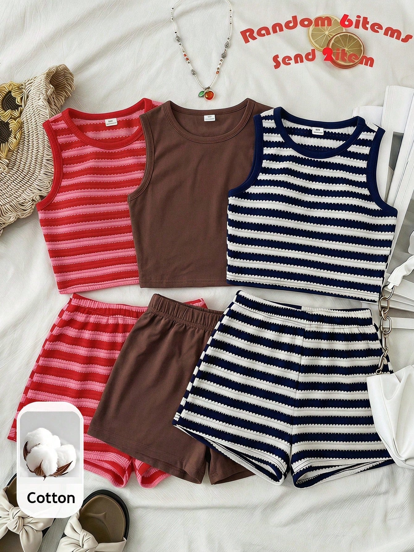 Tween girls black and white two-piece casual summer outfit featuring a rib-knit cropped top with round neck and matching shorts with contrast piping.