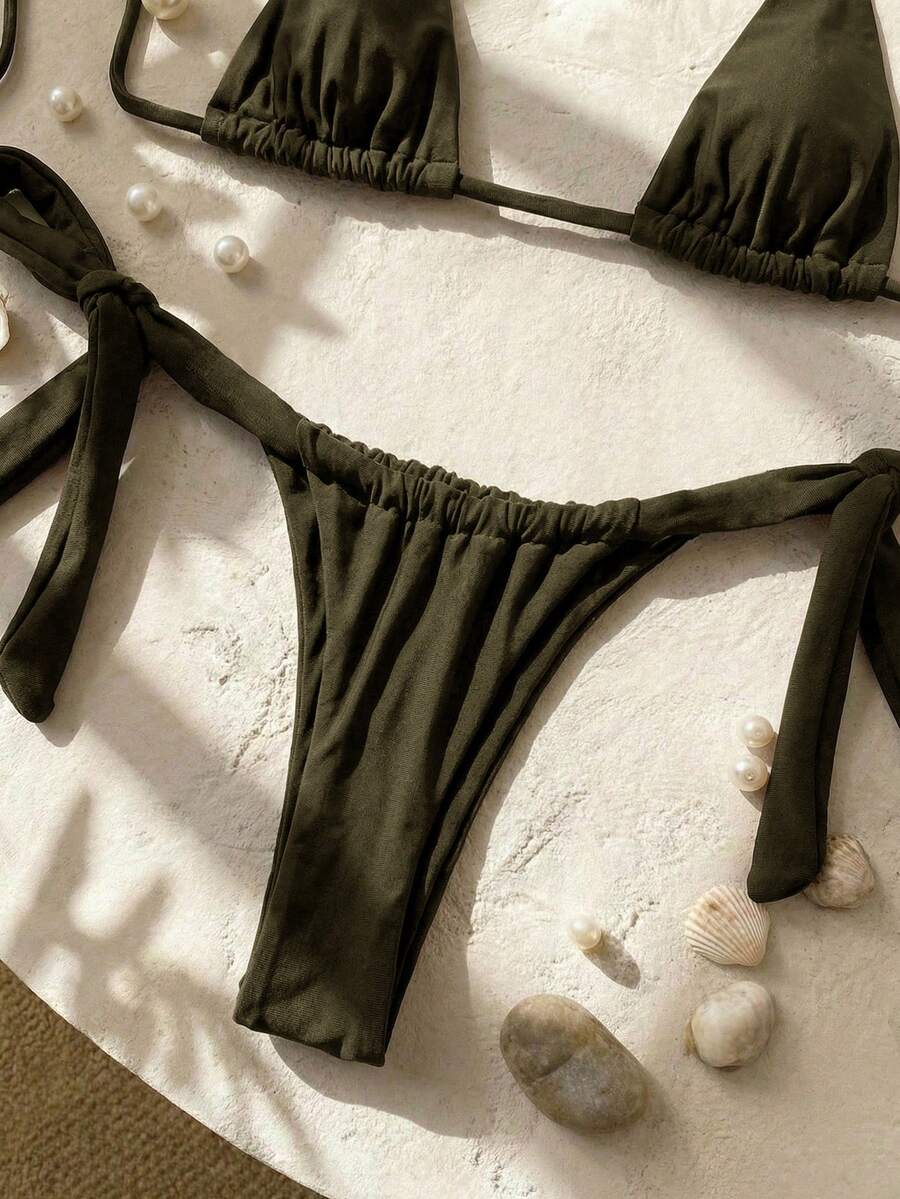 Army green high waist micro bikini swimsuit set for women featuring wireless spaghetti strap top with chain knot details and tie side thong bottoms.