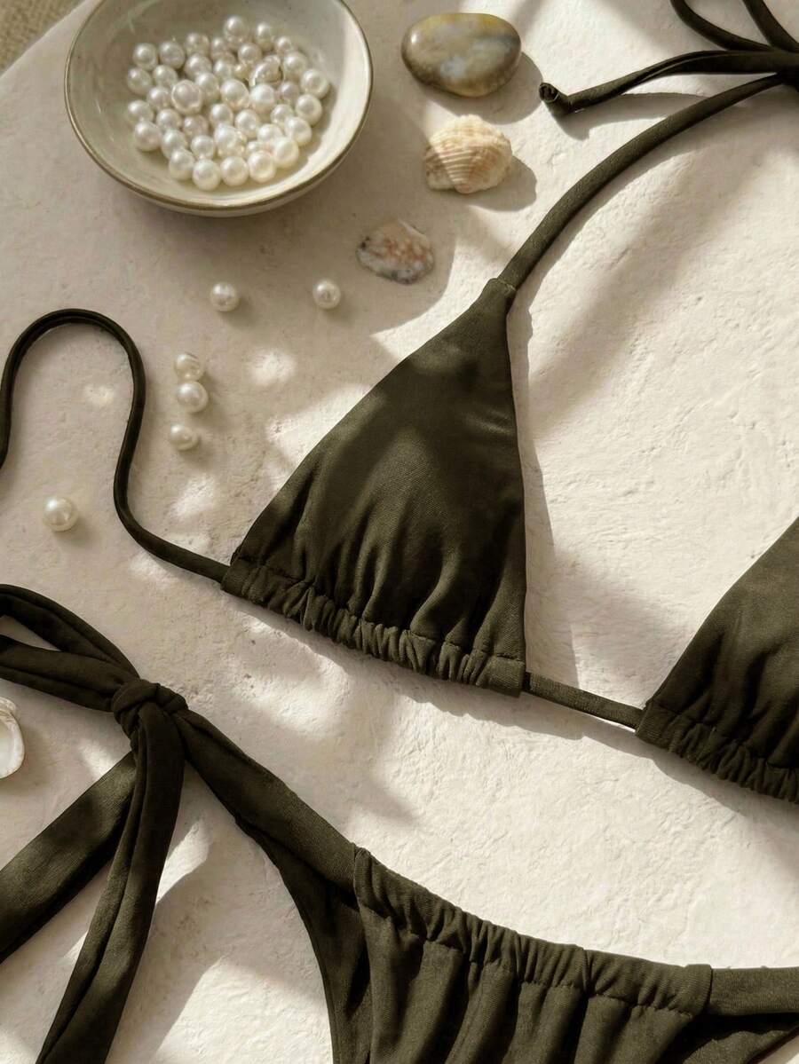 Army green high waist micro bikini swimsuit set for women featuring wireless spaghetti strap top with chain knot details and tie side thong bottoms.