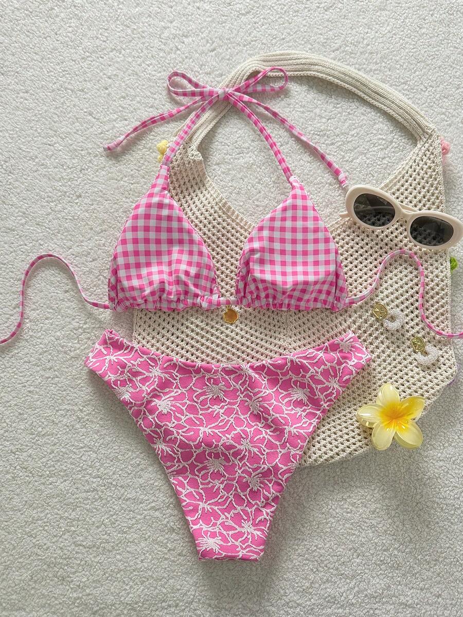 Women's black textured plaid 2-piece bikini set featuring a halter neckline, wireless triangle cups with removable padding, and mid-waist bottoms.