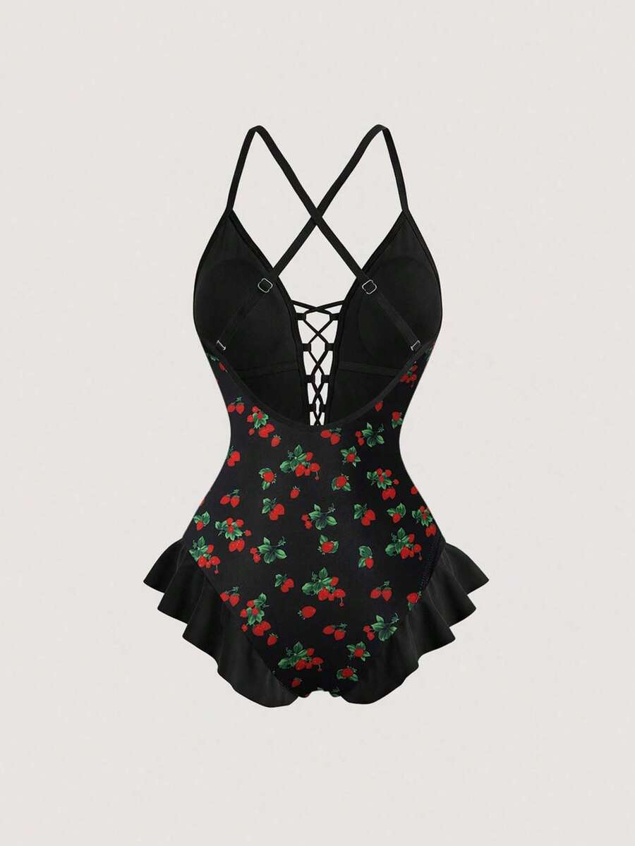 Women's strawberry print one-piece swimsuit featuring ruffle details, front-tie design, backless criss-cross straps, and triangle wireless cups.