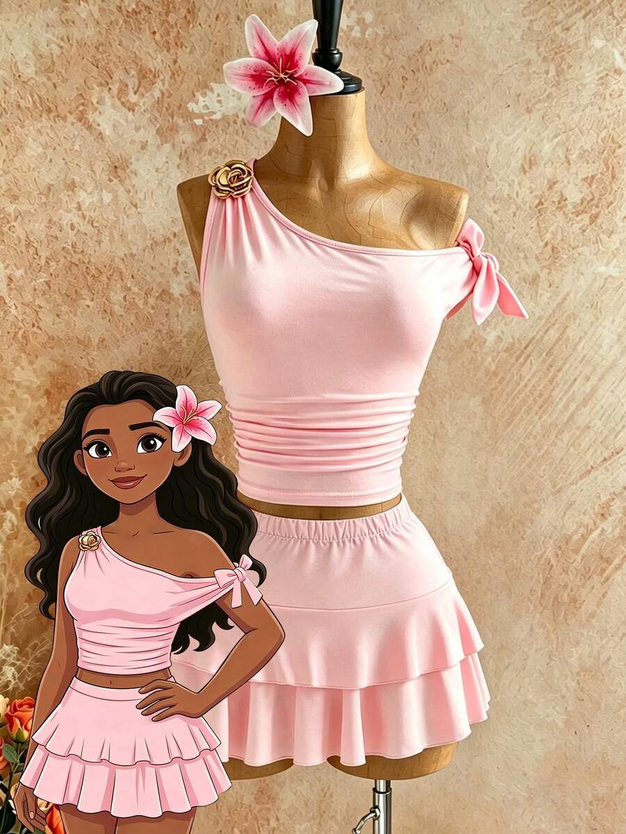 Light blue two-piece outfit set for tween girls with a sleeveless round neck vest top and a tiered ruffle cake skirt featuring a plant pattern.