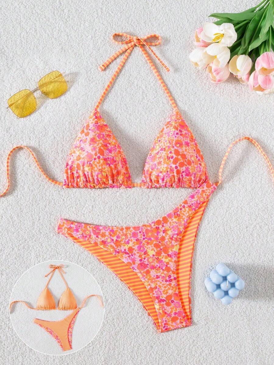 Women's two-piece halter bikini set featuring high cut thong bottoms and removable padding
