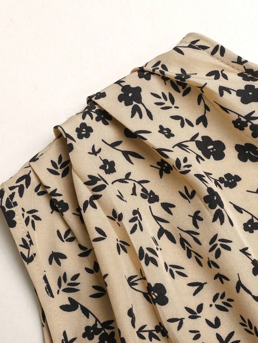 Tween girl wearing an apricot plant print long dress featuring a stand collar, short sleeves, high waist, flared hem, and back zipper closure.