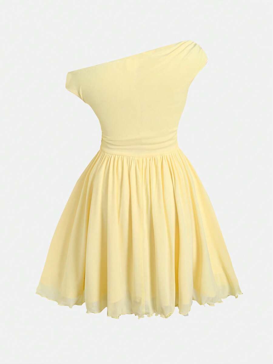 Tween girl wearing an apricot asymmetrical tiered sleeveless party dress with an A-line silhouette.