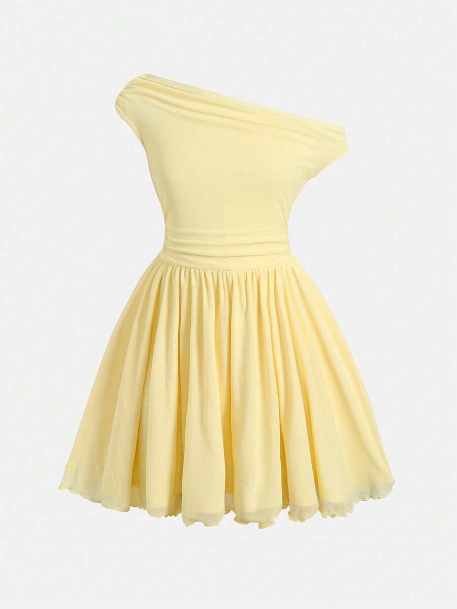 Tween girl wearing an apricot asymmetrical tiered sleeveless party dress with an A-line silhouette.